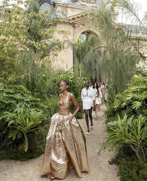 Runway show in a garden setting